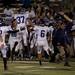 Pioneer junior linebacker Bradley Koenig celebrates with his team after intercepting the ball in the remaining minutes against Saline High School on Friday. Pioneer won 7-6. Daniel Brenner I AnnArbor.com